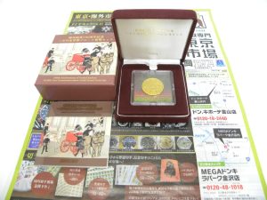 金沢市内 買取専門 東京市場 メガドンキラパーク金沢店 記念硬貨 郵便制度 150周年記念 一万円金貨幣 買取しました。